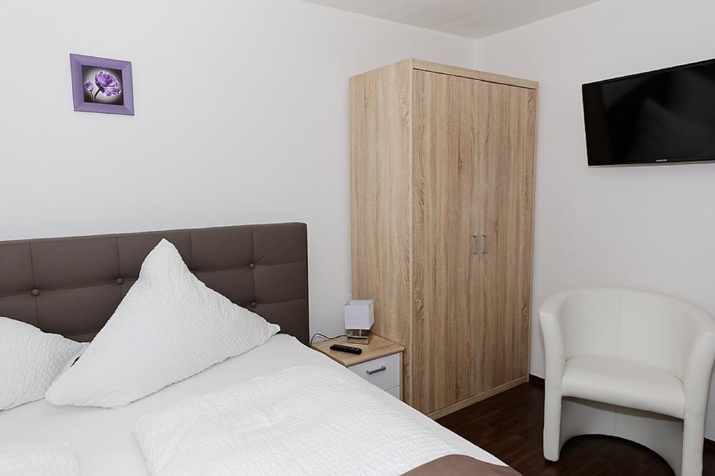 Hotel Huettl - Garni Worms Chambre photo